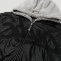 Close-up of the Geedup branding on the DEL 05 Handstyle Team Logo Reversible Leather Faux Fur Jacket in side one.4