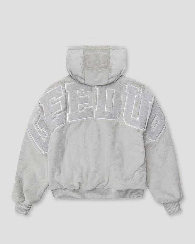 Rear view of the Geedup DEL 05 Handstyle Team Logo Reversible Leather Faux Fur Jacket in side two.